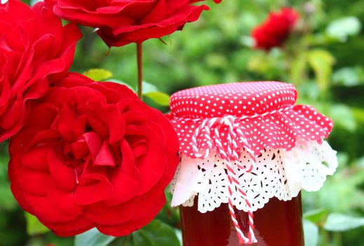 The picture shows rose jelly in the garden