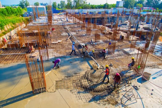 Guwahati, India - june 2019 : labor is working on a new constructing buildings in guwahati