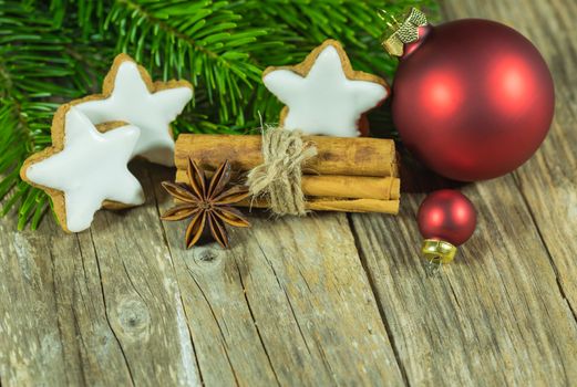 Christmas composition on star cookies, spieces and ornaments