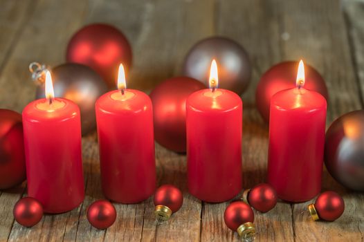 Christmas candles with balls ornaments