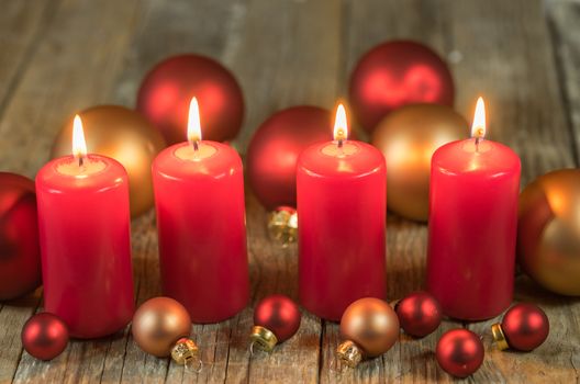 Christmas advent four red burning candles