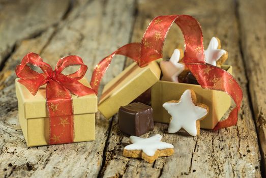 Christmas sweet gift box with star cookie and chocolate