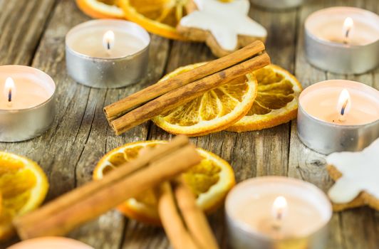 Aromatic Christmas decoration with festive burning candles