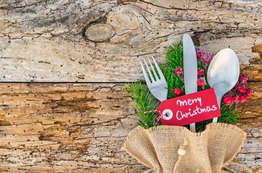 Christmas dinner cutlery for holiday top view. Empty space for text