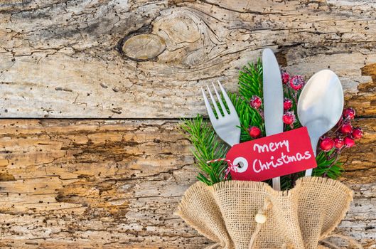 Christmas dinner cutlery for holiday top view. Empty space for text