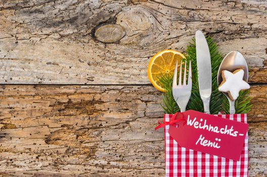 Christmas dinner cutlery, with tag and german text, Weihnachts-Menue, means christmas menu