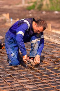 Reinforcement bars for base plate for house foundation for new house basis.