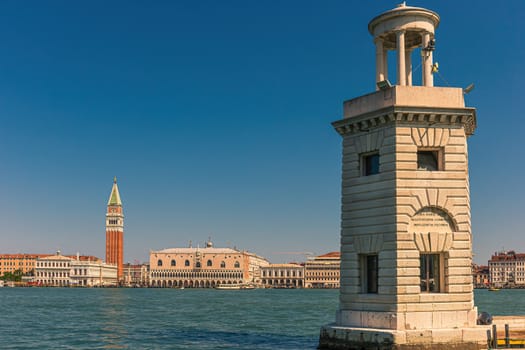 Venice skyline seen from San Giorgio Maggiore with lighthouse
