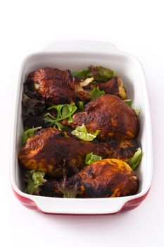 Roasted tandoori chicken with basmati rice isolated on white background