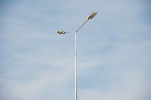 Street lamp with beautiful blue sky in background