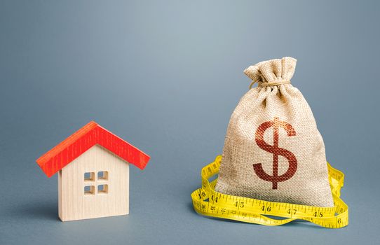 House and a dollar money bag. Property real estate valuation. Buying and selling, fair price. Calculation of expenses for purchase, construction and repair. Building maintenance. Mortgage loan