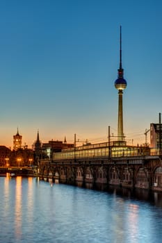 Sunset at the river Spree in Berlin with the TV Tower