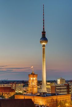 The Television tower and the townhall in Berlin after sunset