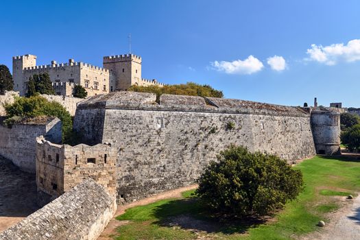 The walls and turrets of the medieval castle of the Joannite Order in the city of Rhodes