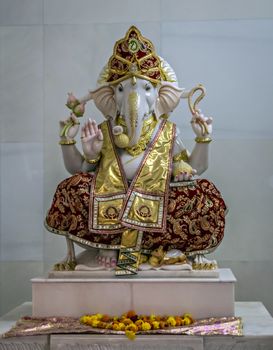 Nicely carved and decorated isolated idol of Hindu God Ganesha in a temple at Somnath, Gujrat, India.