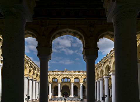 Interior view of 1636 built Nayakkar palace, enriched with beautiful arched columns with open blue sky.