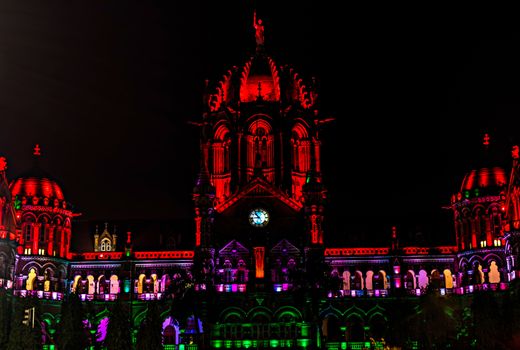 UNESCO world heritage building of `Chatrapati Shivaji Maharaj Terminus` railway station illuminated resembling like Indian flag