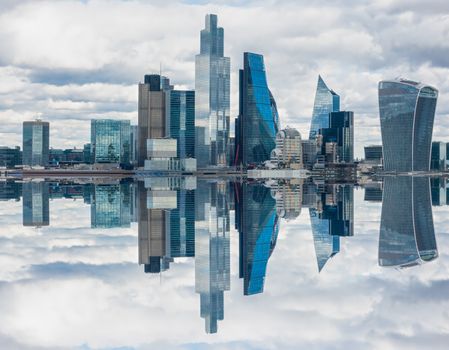 Vertical mirror effect of London, UK city skyline and skyscrapers