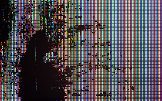 broken color lcd screen high magnigication shot with visible leakage of crystals.