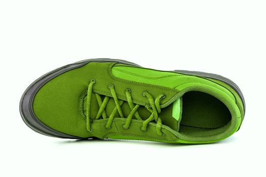 right cheap green hiking or hunting shoe isolated on white background.