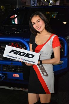 PASAY, PH - DEC. 7: Rigid Industries female model at Bumper to Bumper 15 on December 7, 2019 in Mall of Asia Concert Grounds, Pasay, Philippines. Bumper to Bumper is a annual aftermarket car show event in the Philippines.