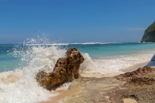 Splashing waves on shore. Waves splashing sea beach