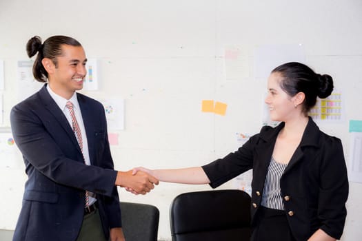 successful business partner shaking hands after with meeting in the office.