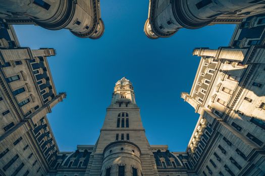 Uprisen angle of Philadelphia city hall with historic building over blue sky background, Pennsylvania, USA or United States of America, Architecture and building, Travel and Tourism concept