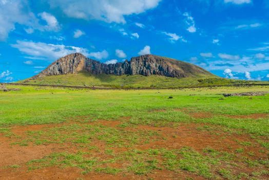 A mountain rises up from the earth on the distance