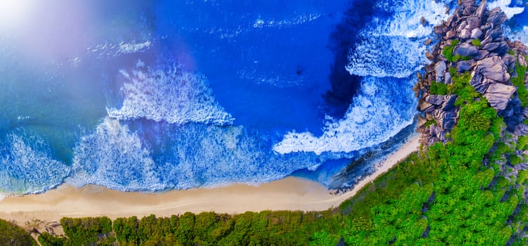 Coast as a background, aerial top view. Turquoise water background from top view. Summer seascape from air. Beautiful ocean