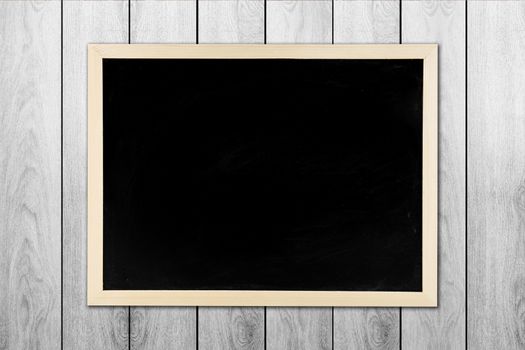 blackboard with wooden frame, blackboard on old wood background for concept education.