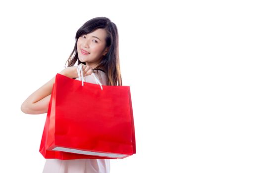beautiful smiling asian young women with shopping sale bags isolated on white background.