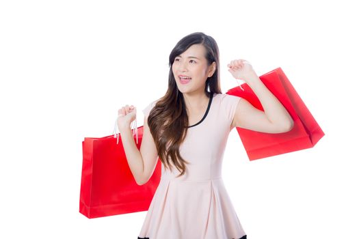 beautiful smiling asian young women with shopping sale bags isolated on white background.