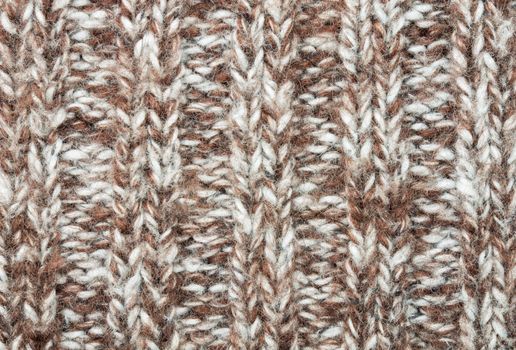 Brown knitting fabric texture background or knitted pattern background. Knitting or knitted background. Brown knitting. Brown  knitting background. Brown knitting texture.