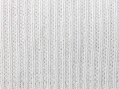 White knitting or knitted fabric texture pattern background. Knitting or knitted. White knitting background. knitting texture, knitting pattern.
