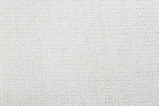 White knitting or knitted fabric texture pattern background. Knitting or knitted. White knitting background. knitting texture, knitting pattern.