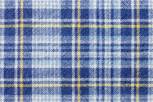 Blue and yellow tartan or plaid background for fashion design. Tartan or plaid pattern. Tartan or plaid background, Tartan or plaid fabric texture. Tartan or plaid texture.