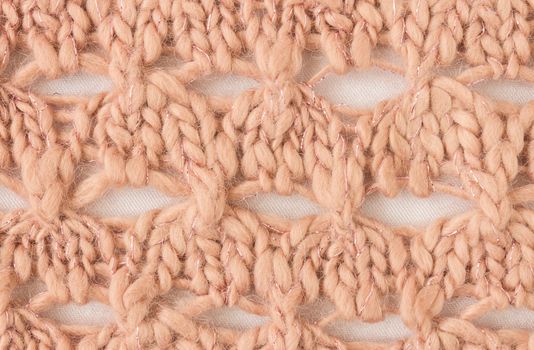 Brown Knitting Pattern or Knitted Pattern Background in macro style. Knitting Pattern or Knitted Pattern in vintage style for design