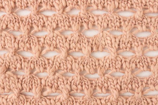 Brown Knitting Pattern or Knitted Pattern Background in macro style. Knitting Pattern or Knitted Pattern in vintage style for design