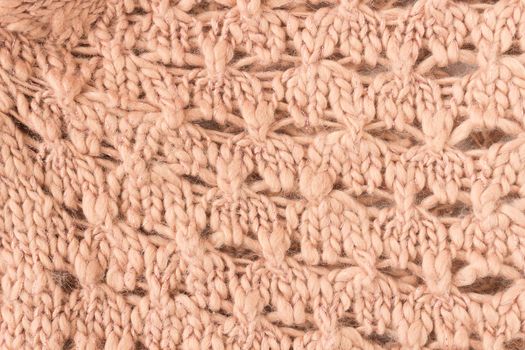 Brown Knitting Texture or Knitted Texture Background in macro style. Knitting Texture or Knitted Texture in vintage style for design