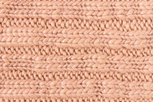 Brown Knitting Texture or Knitted Texture Background in macro style. Knitting Texture or Knitted Texture in vintage style for design