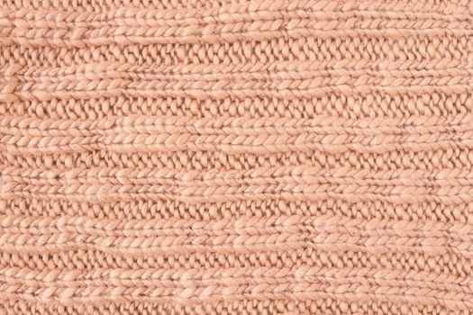 Brown Knitting Texture or Knitted Texture Background in macro style. Knitting Texture or Knitted Texture in vintage style for design