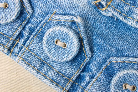 Part of jeans jacket. Jeans button on jeans tag for fashion design.