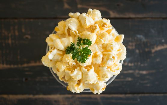 Sweet Caramel Popcorn and Whipped Cream and Fresh Milk with Parsley. Cold Beverage caramel popcorn and whipped cream and fresh milk. Caramel popcorn and whipped cream and fresh milk for food and drink category