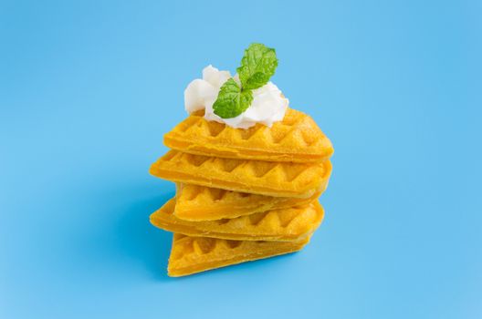 5 Pieces Waffle on Blue Pastel Background Minimalist Style. Heart shape waffle dessert in minimalist style for food and dessert category