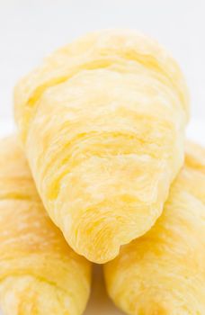 Croissant or Bread or bakery on white dish close up view