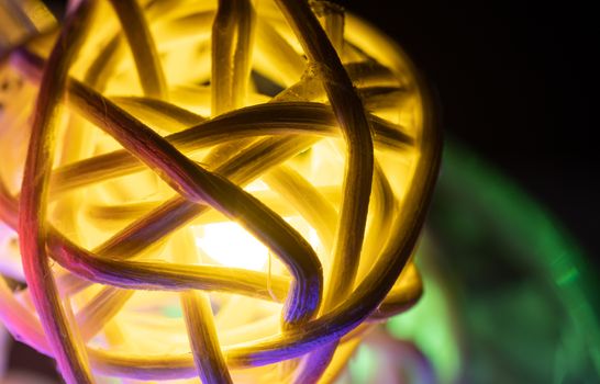 Yellow Christmas Lights Rattan Ball on Black Background