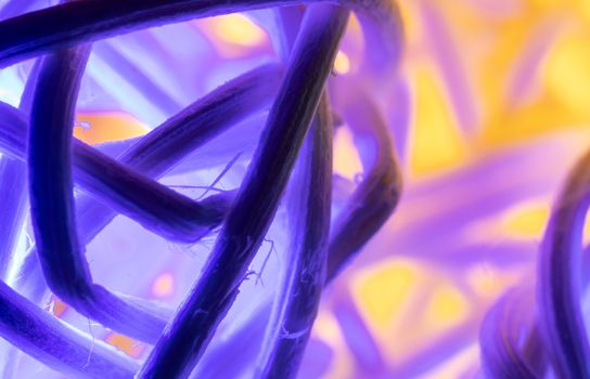 Abstract Purple Yellow Christmas Lights Rattan Ball Background in Close up View