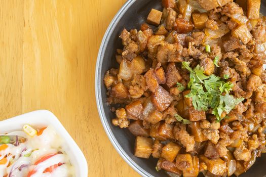 Stir Fried Pork with Onion and Garlic and Black Soy Sauce and Coriander Topping and Tofu and Vegan Salad on Right Frame and Flaylay View