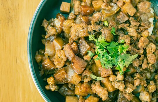 Stir Fried Pork with Onion and Garlic and Black Soy Sauce and Coriander Topping and Tofu with Natural Light on Right Frame and Flaylay View in Vintage Tone